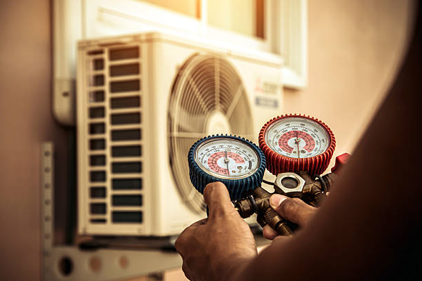 Professional Hvac technician working in Wellesley Hills, MA